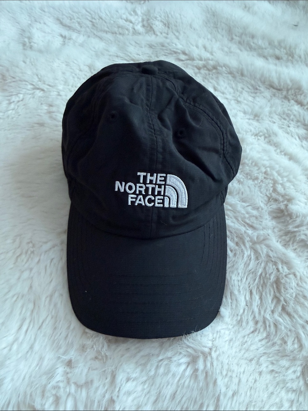The North Face Black Baseball Cap with White Logo